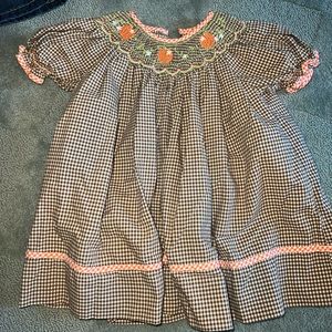Petit Ami smocked pumpkin dress
